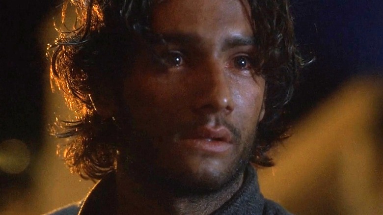 The Stranger in awe in The Roman Spring of Mrs. Stone