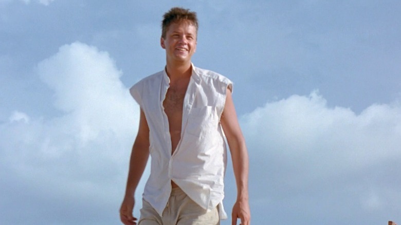 Andy standing on boat in Mexico