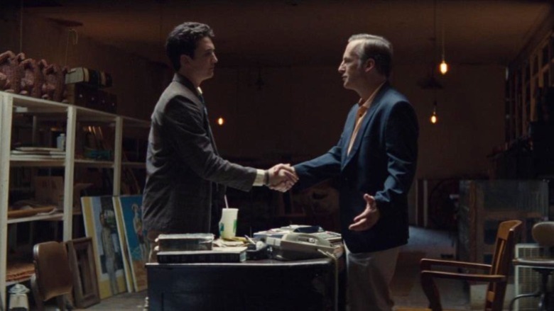Sutter and his boss shaking hands