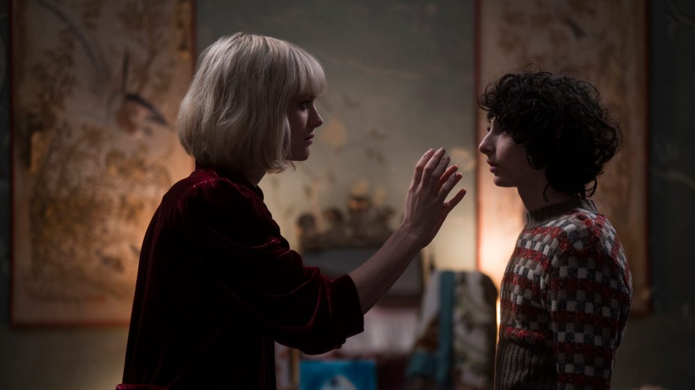 Mackenzie Davis and Finn Wolfhard in The Turning