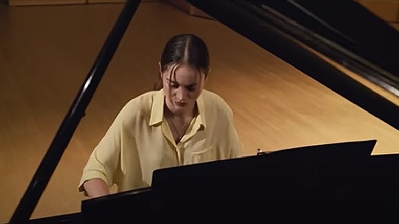 Katie playing piano The Unforgivable