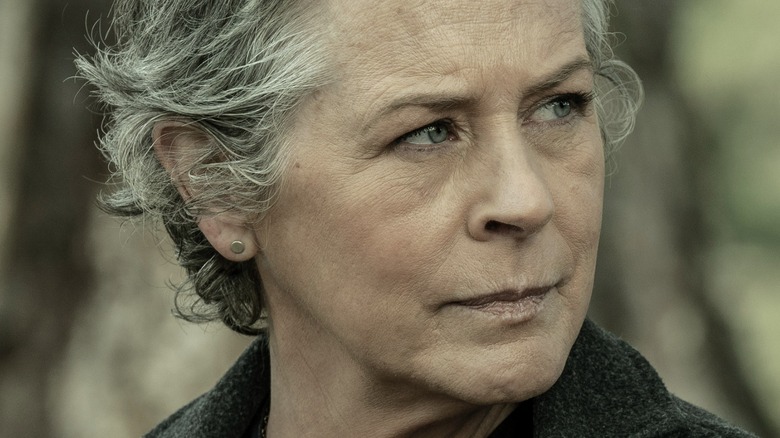 Melissa McBride scowls as Carol Peletier