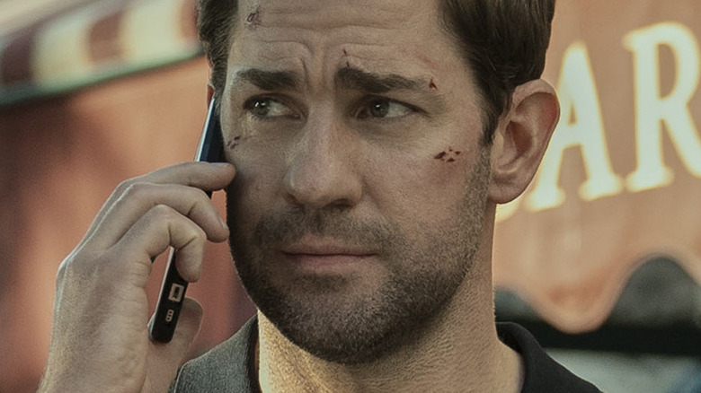 Jack Ryan using cellphone