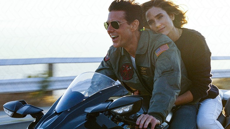 Maverick and Penny riding a bike