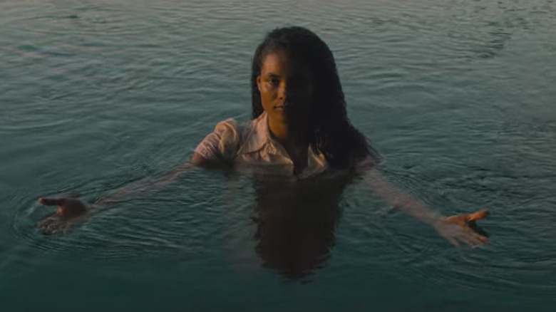 Agnes in water arms outstretched