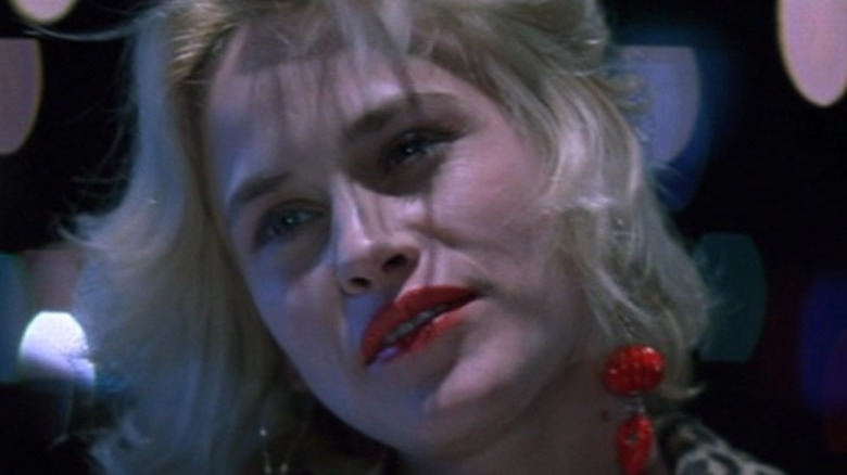 Patricia Arquette red lipstick and earrings