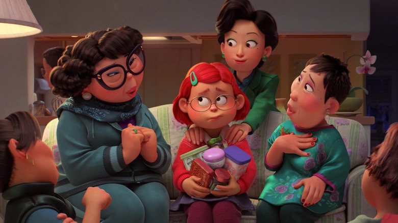 Mei sitting uncomfortably with aunties