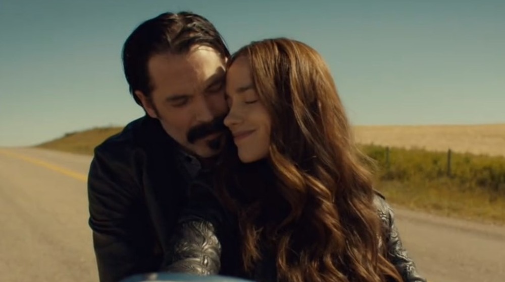 Wynonna and Doc ride into the sunset together