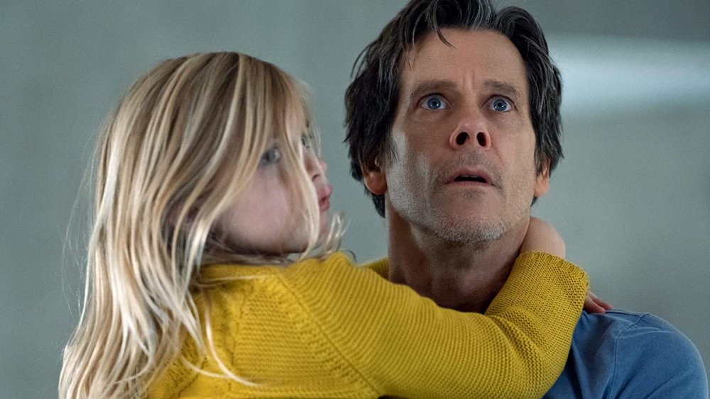 Kevin Bacon's Theo Conroy holds his daughter in You Should Have Left