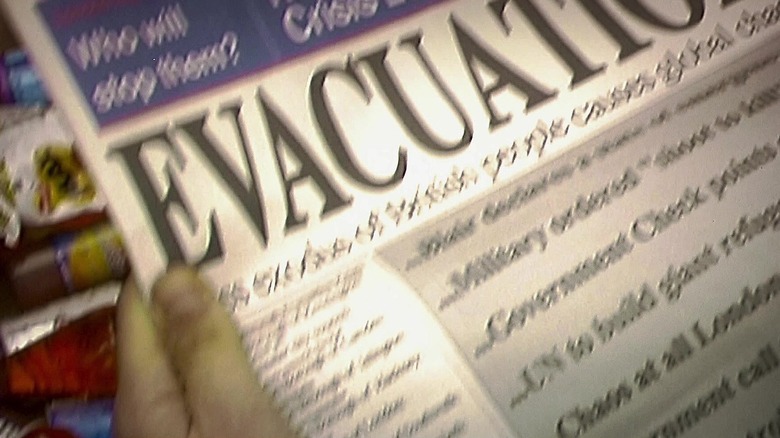 Newspaper announcing evacuation in 28 Days Later (2002)