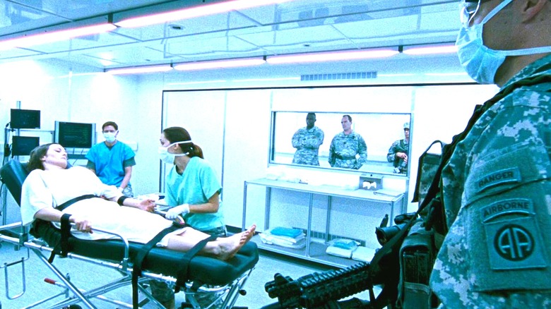 Alice in a hospital bed in 28 Weeks Later (2007)