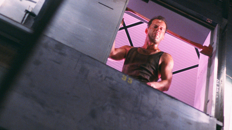 John looks down the elevator shaft