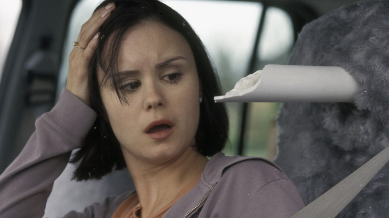 Kat Jennings dodging death in "Final Destination 2" (2003)