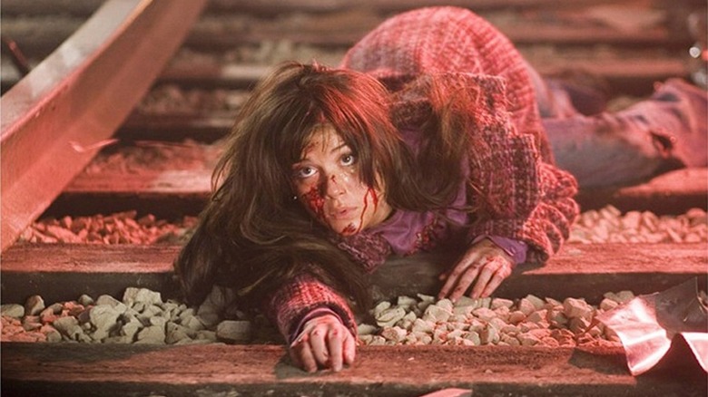 Wendy crawls along the train tracks in "Final Destination 3" (2006)