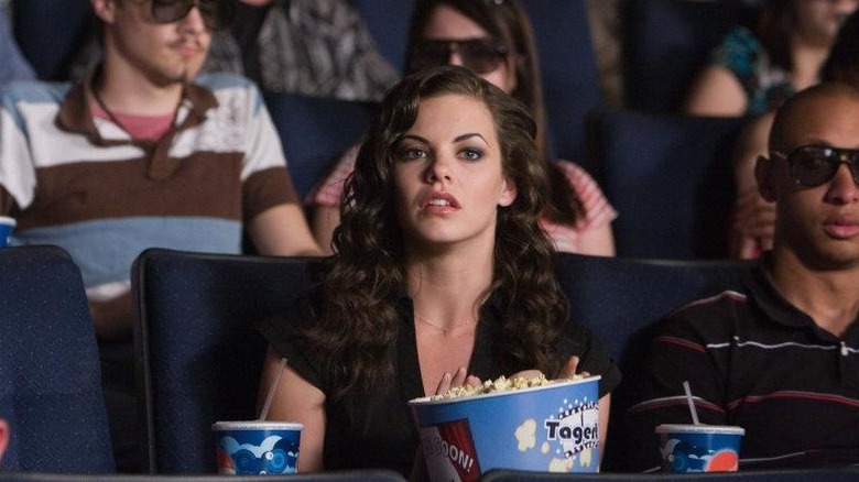 Janet among her fellow saved moviegoers in "The Final Destination" (2009)