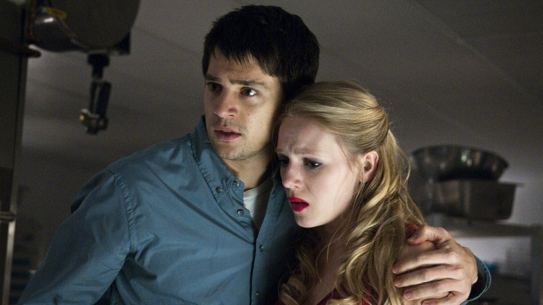 Sam and Molly huddle in "Final Destination 5" (2011)
