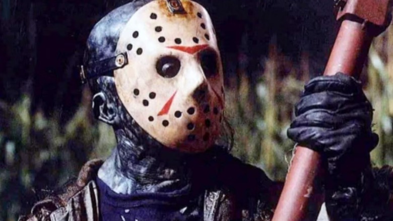 Jason in the swamp, holding an axe