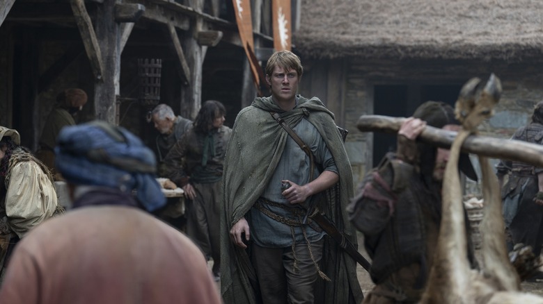 Ser Duncan walking through a crowd on The Knight of The Seven Kingdoms