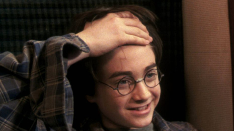 Harry reveals his scar