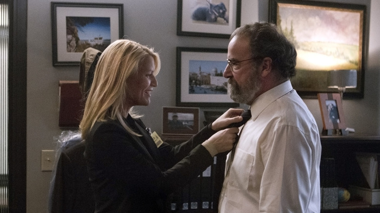 Carrie Mathison fixing Saul Berenson tie