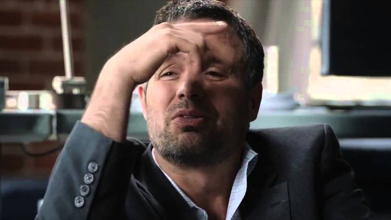 Banner sleepily listens to Tony Stark in "Iron Man 3" (2013)