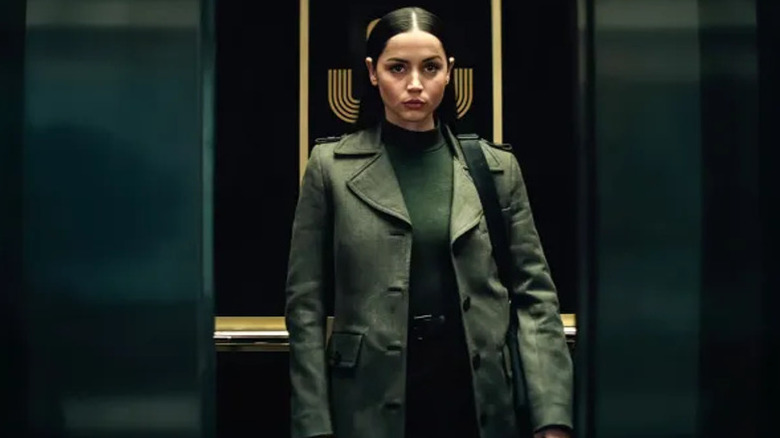 Eve in an elevator in the Continental in "Ballerina"