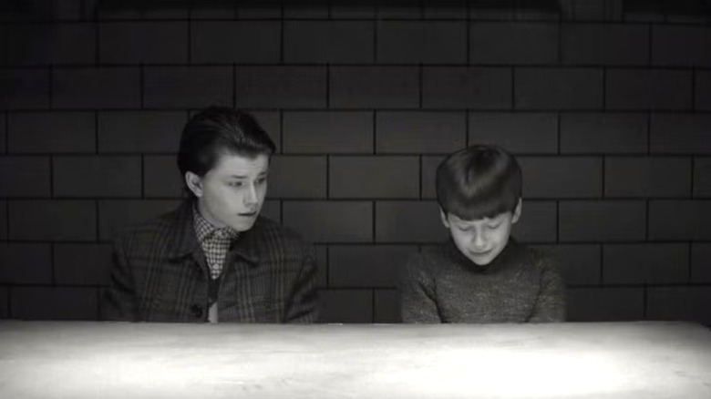 Young Winston and Ben at a police station