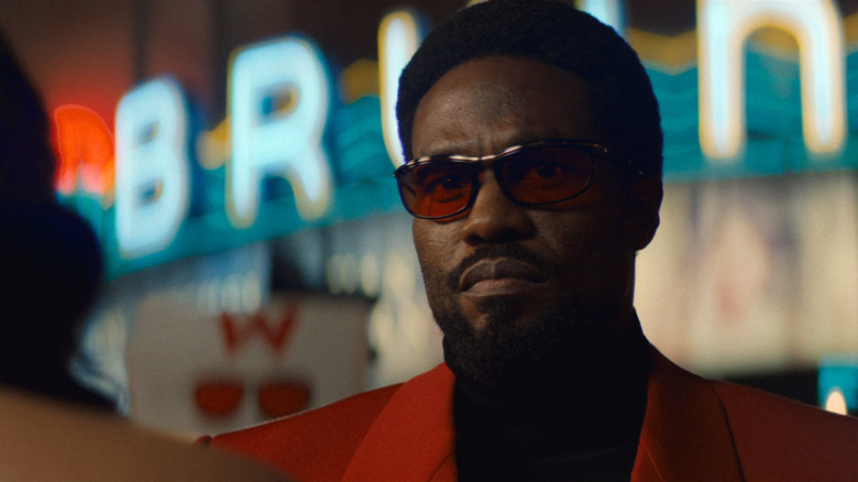Simon Williams wearing red sunglasses on "Wonder Man" (2026)