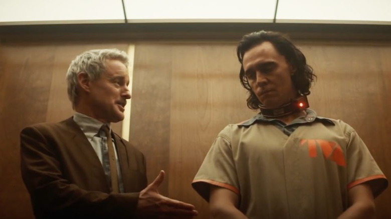 A captive Loki and Moebius talking at the TVA in "Loki" (2021)