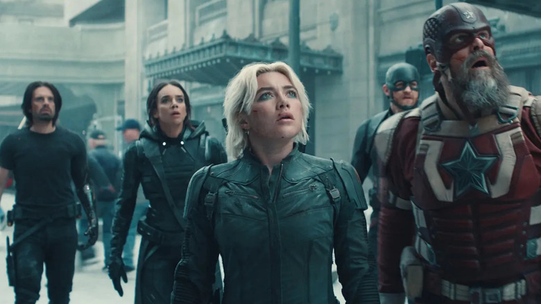 Bucky, Ghost, Yelena, U.S. Agent, and Red Guardian look up at the sky in "Thunderbolts*" (2025)