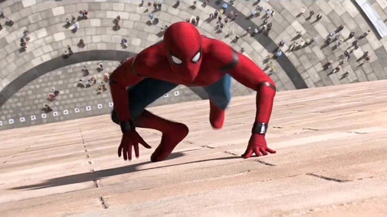 Spider-Man running up the side of a building in "Spider-Man: Homecoming" (2017)