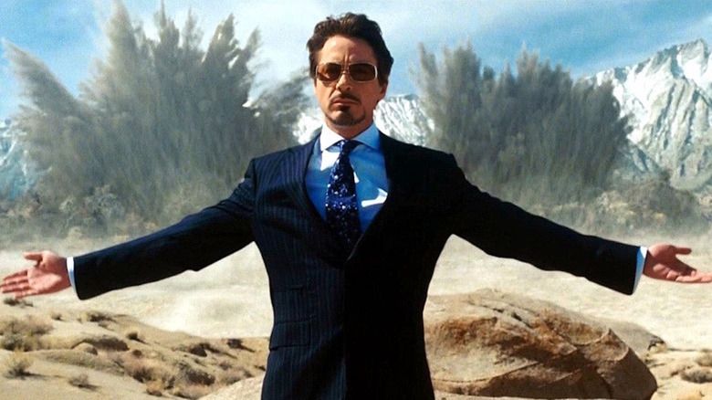 Tony Stark shows off explosions in the desert in "Iron Man" (2008)