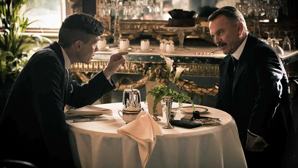 Cillian Murphy as Tommy Shelby and Sam Neill as Chester Campbell in Peaky Blinders