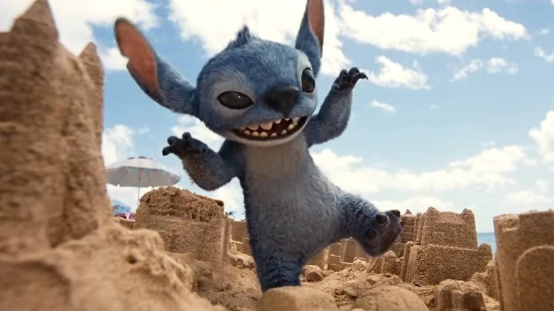 Stitch knocking over sand castles in 2025's Lilo & Stitch