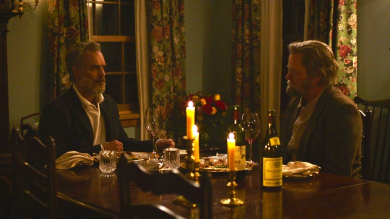 Bill and Frank eating a candlelit dinner