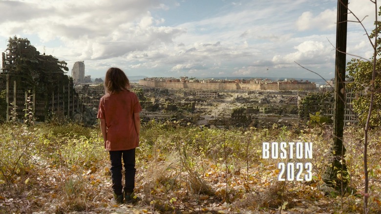 Girl looking at Boston ruins