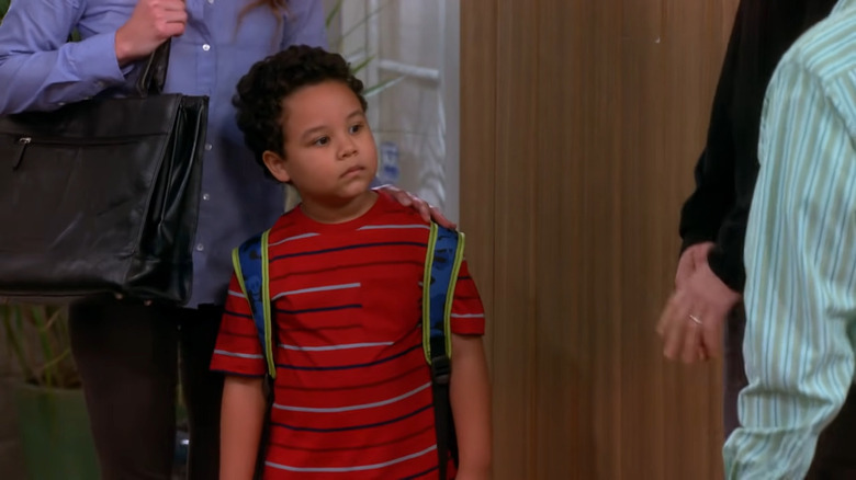 Louis staring at Alan and Walden