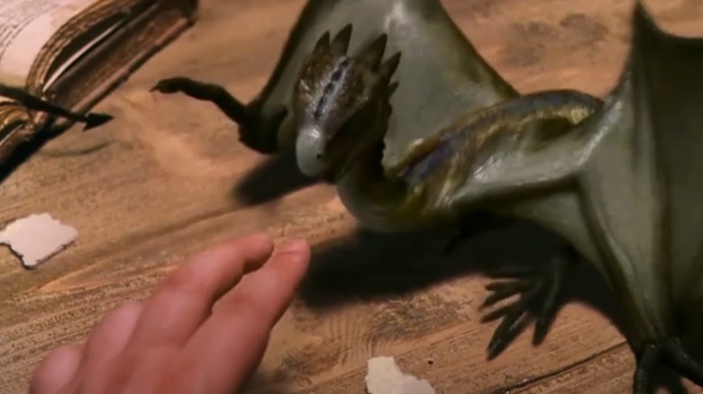 Norberta the dragon, looking at hand