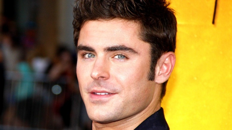 Zac Efron yellow background