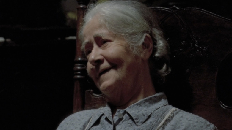 Karras' mother in rocking chair