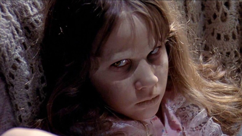 Possessed Regan stares menacingly in The Exorcist