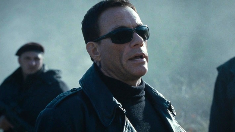 Jean Vilain wearing sunglasses in The Expendables 2