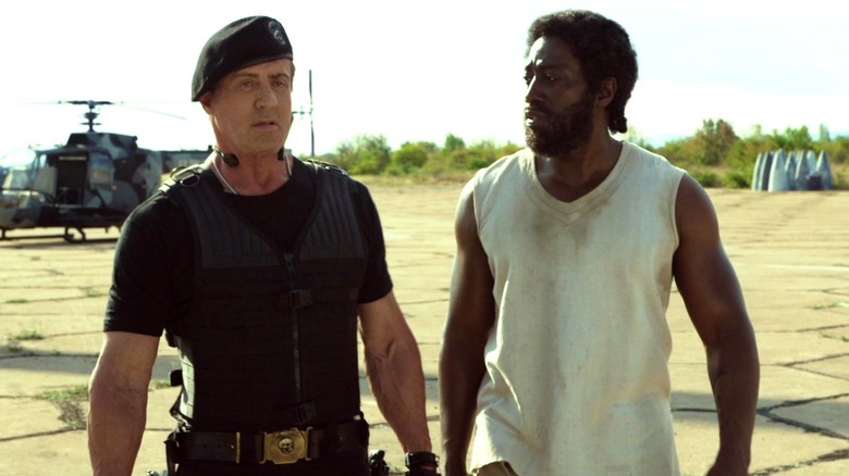 Barney Ross and Doctor Death walking together in The Expendables 3