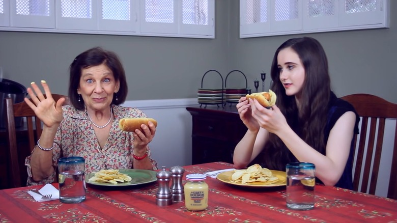 Two women sit at a table