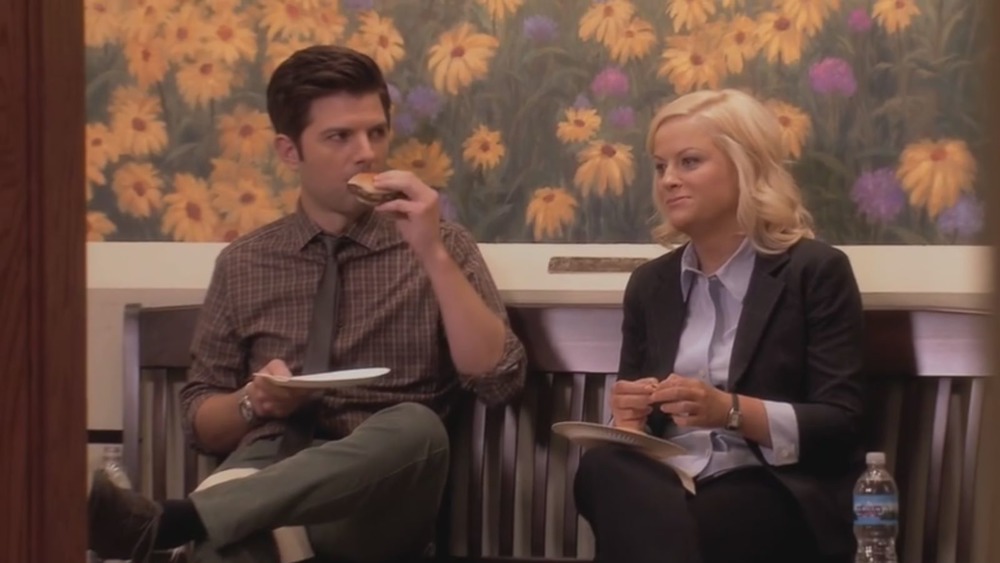 Adam Scott as Ben Wyatt and Amy Poehler as Leslie Knope on Parks and Recreation