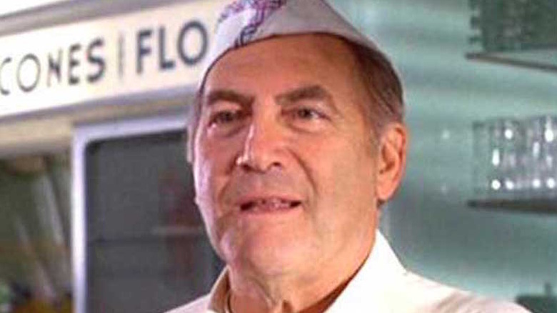 Norman Alden is dressed as a diner counterman