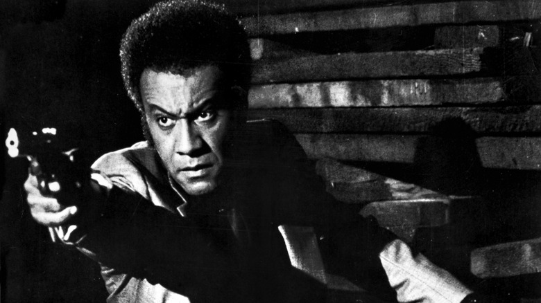 Raymond St. Jacques aims gun