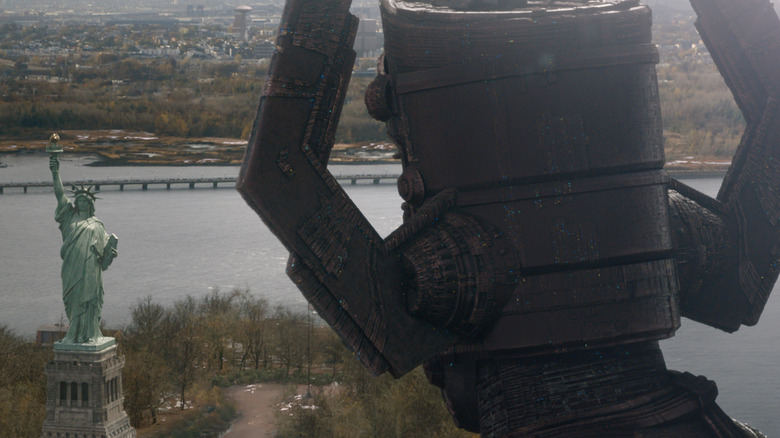 Galactus looking at the Statue of Liberty in The Fantastic Four: First Steps