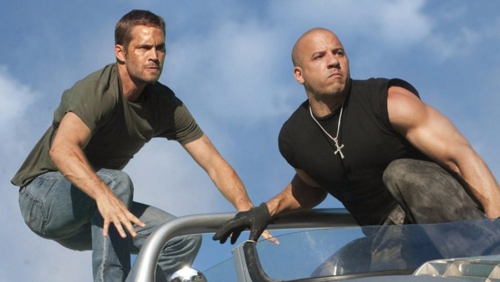 Vin Diesel as Dom Toretto and Paul Walker as Brian O'Conner in Fast and Furious