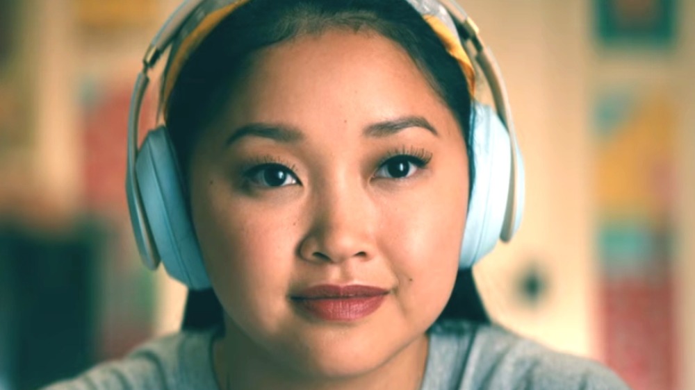 Lara Jean wearing headphones